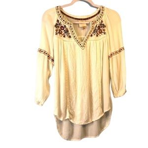 Knox Rose size small white with orange floral embroidery.​​